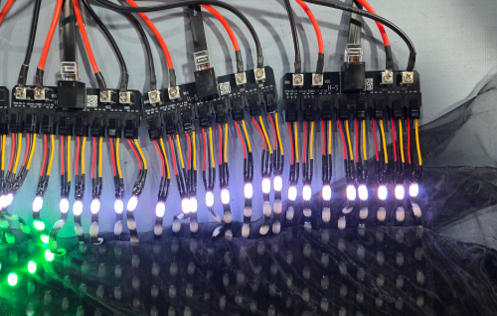 KRÜGEAR jersey pixel matrix on the bench — real hardware in development